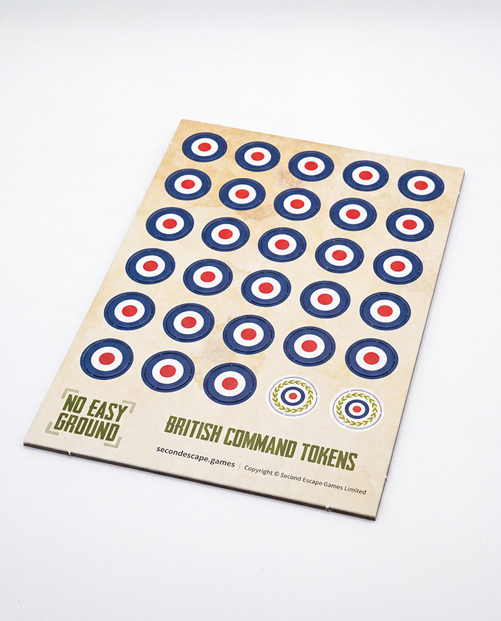 A sheet of vintage British Command Tokens for the board game No Easy Ground, featuring rows of round target stickers with blue, white, and red concentric circles on a beige backing card.