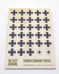 A sheet of vintage German Command Tokens for board games, featuring black and white iron crosses on a beige backing card with 'German Command Tokens' printed at the bottom.